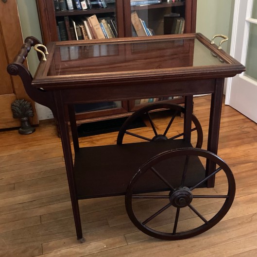 1940s wooden tea cart with glass top and brass handles